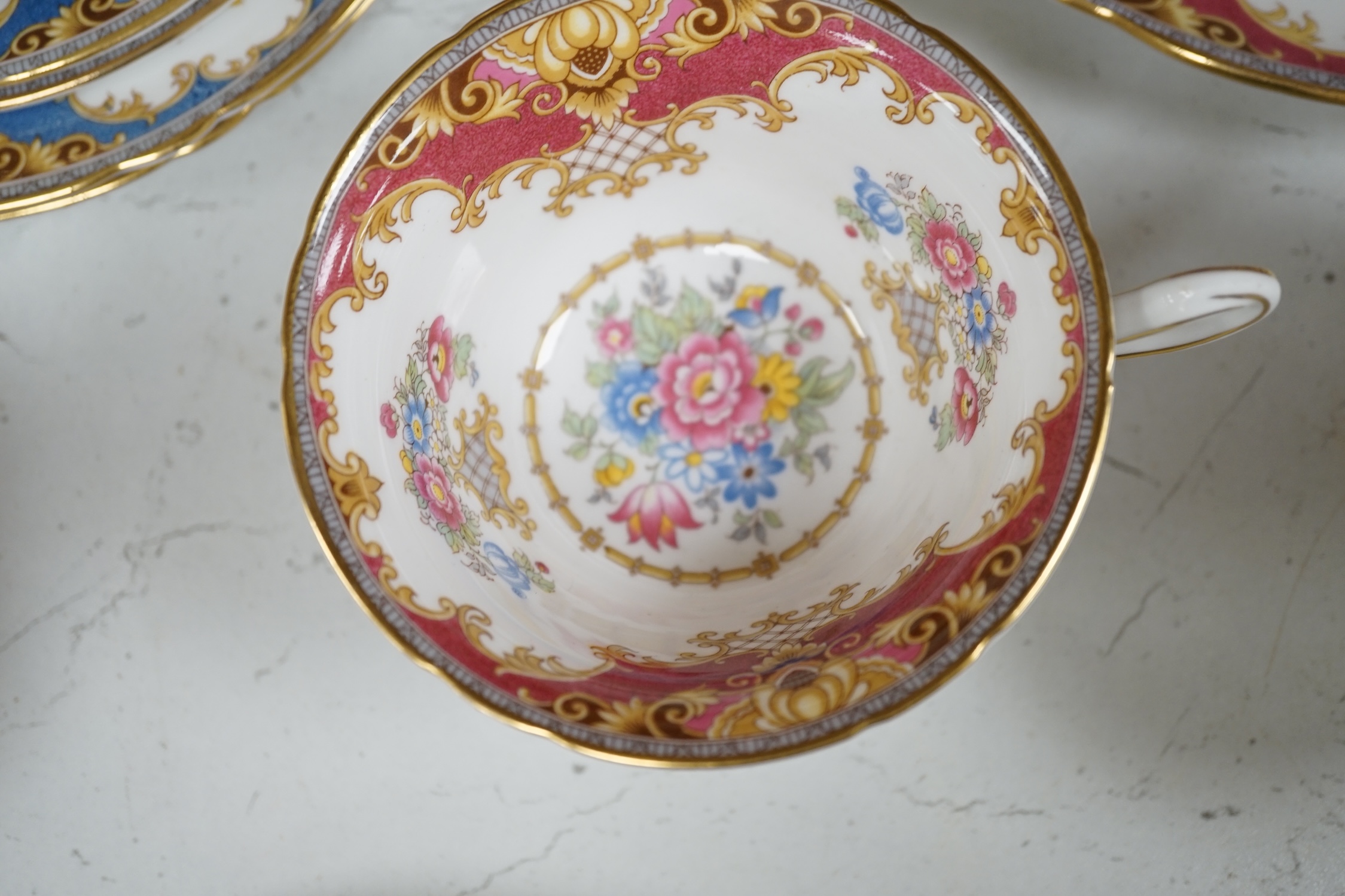 A Shelley harlequin part tea set in blue, green and pink, together with four Rosenthal dishes. Condition - good